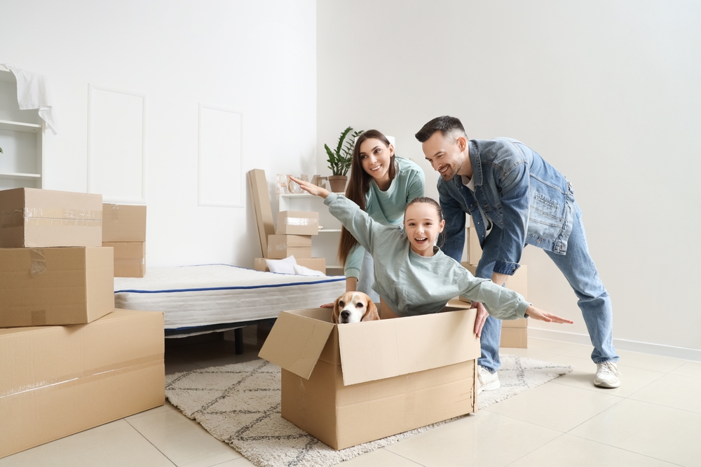 Happy Family with New House - Forge Home Consulting